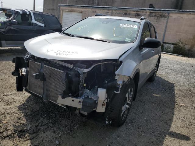 Photo 2 from auction – 2018 TOYOTA RAV4 LE with VIN JTMBFREV9JJ214240
