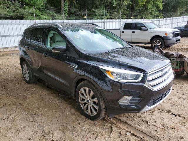 FORD ESCAPE TIT 2017 with VIN 1FMCU0JD0HUC94759 - Photo from auction