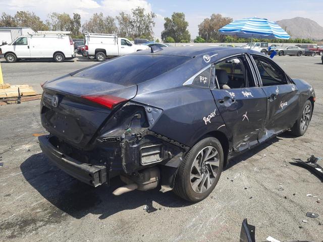 Photo 4 from auction – 2018 HONDA CIVIC EX with VIN 2HGFC2F79JH525350