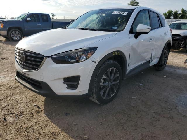 Photo 2 from auction – 2016 MAZDA CX-5 GT with VIN JM3KE2DYXG0703449