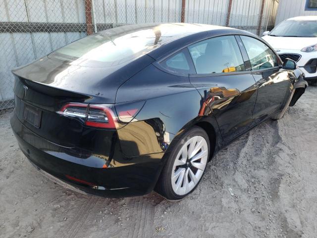 Photo 4 from auction – 2022 TESLA MODEL 3 with VIN 5YJ3E1EAXNF145660