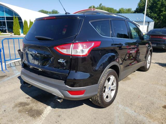 Photo 4 from auction – 2016 FORD ESCAPE SE with VIN 1FMCU9GX1GUC03499