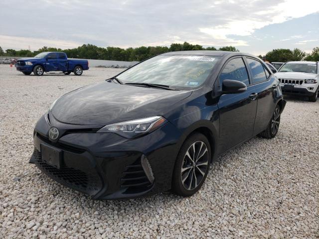 Photo 2 from auction – 2017 TOYOTA COROLLA L with VIN 5YFBURHE1HP610220
