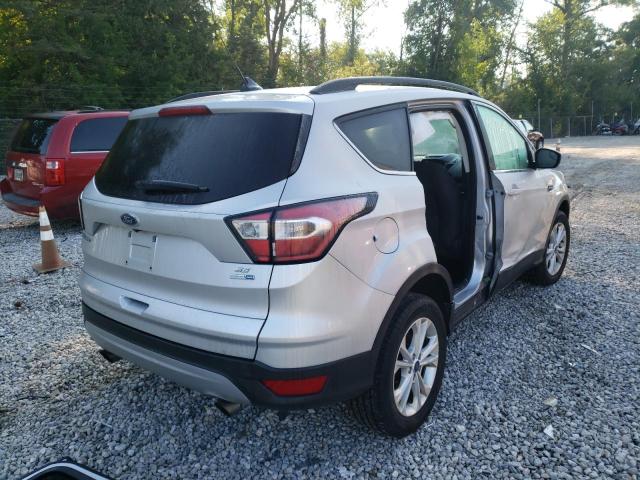 Photo 4 from auction – 2018 FORD ESCAPE SE with VIN 1FMCU9GD8JUC17638