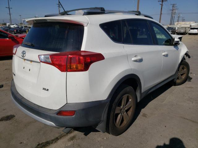 Photo 4 from auction – 2015 TOYOTA RAV4 XLE with VIN JTMWFREV8FJ042842