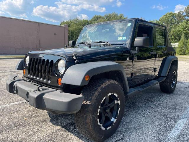 Photo 2 from auction – 2012 JEEP WRANGLER U with VIN 1C4BJWDG1CL274424