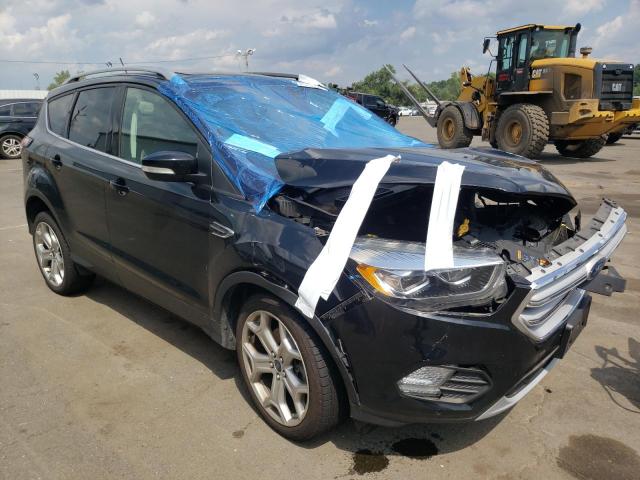 FORD ESCAPE TIT 2018 with VIN 1FMCU9J95JUB01379 - Photo from auction