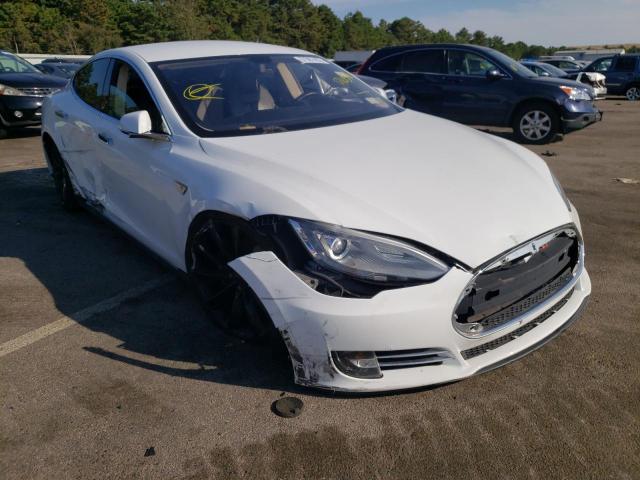 TESLA MODEL S 2013 with VIN 5YJSA1AC8DFP10596 - Photo from auction