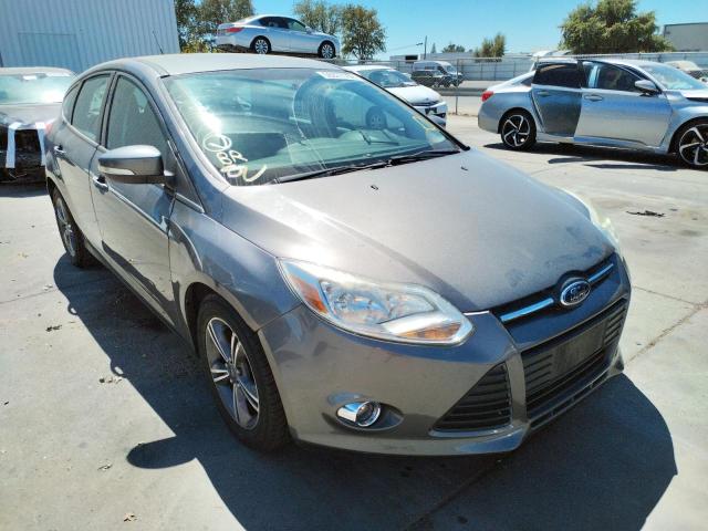 FORD FOCUS SE 2014 with VIN 1FADP3K29EL433051 - Photo from auction
