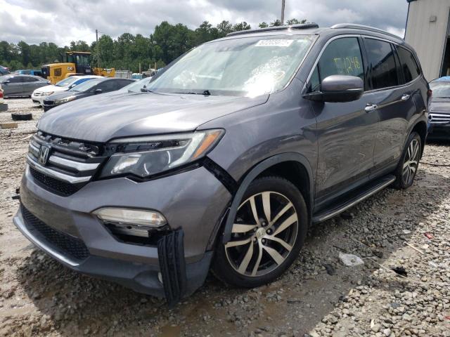Photo 2 from auction – 2017 HONDA PILOT TOUR with VIN 5FNYF5H96HB001295