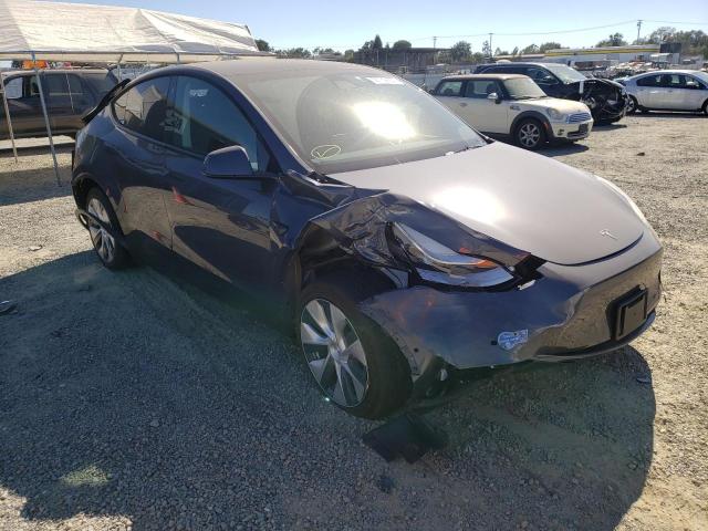 TESLA MODEL Y 2021 with VIN 5YJYGDEE1MF140611 - Photo from auction