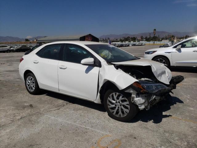 TOYOTA COROLLA L 2018 with VIN 5YFBURHE0JP854821 - Photo from auction