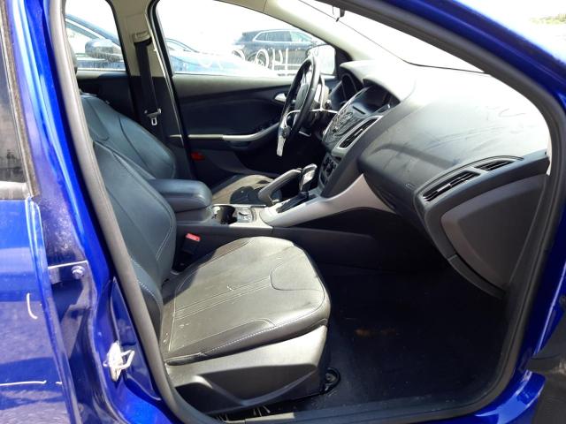 Foto 5 de la subasta – 2014 FORD FOCUS SE con VIN 1FADP3K28EL148289