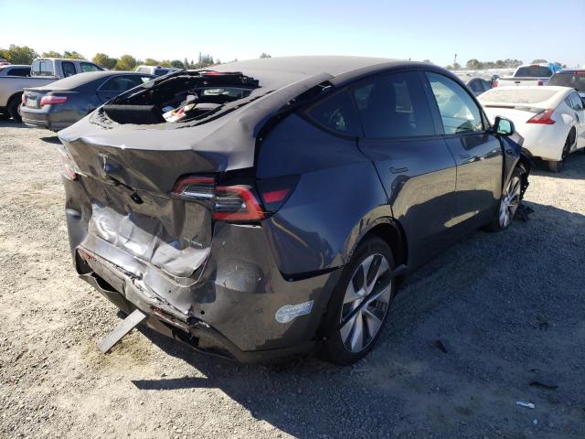 Photo 4 from auction – 2021 TESLA MODEL Y with VIN 5YJYGDEE1MF140611