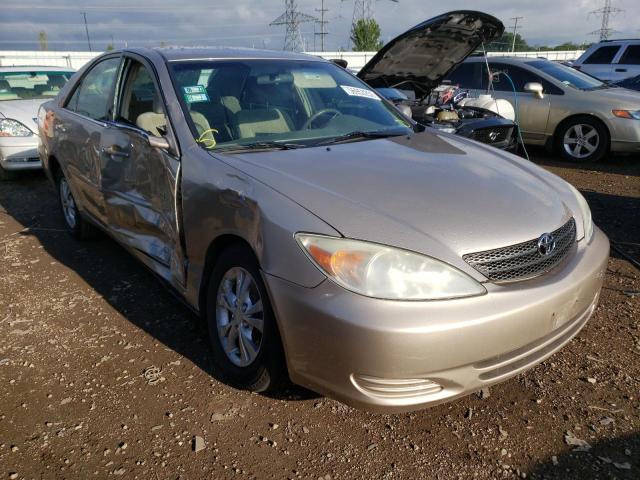 TOYOTA CAMRY LE 2004 with VIN 4T1BF32K44U587319 - Photo from auction