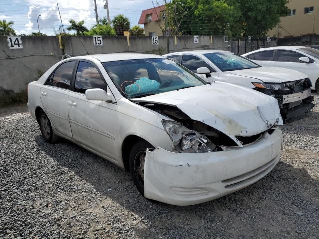 TOYOTA CAMRY LE 2002 with VIN 4T1BF32K22U005442 - Photo from auction