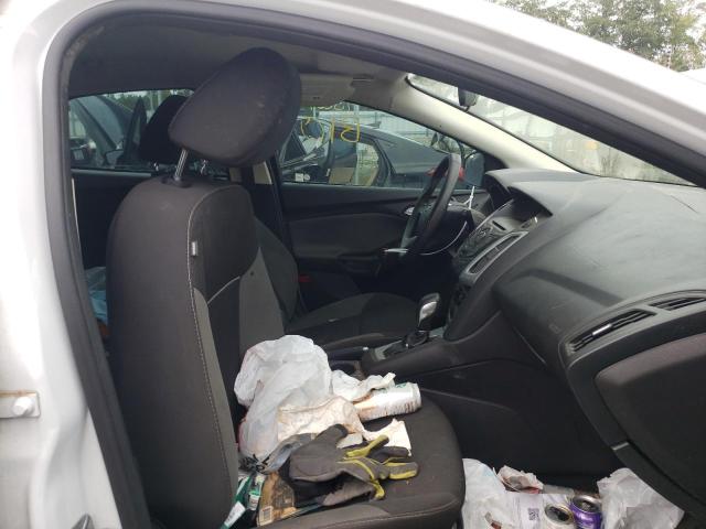 Foto 5 de la subasta – 2014 FORD FOCUS SE con VIN 1FADP3K28EL403409