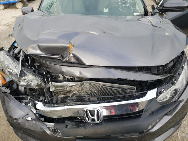 Photo 7 from auction – 2018 HONDA CIVIC EX with VIN JHMFC1F31JX016921