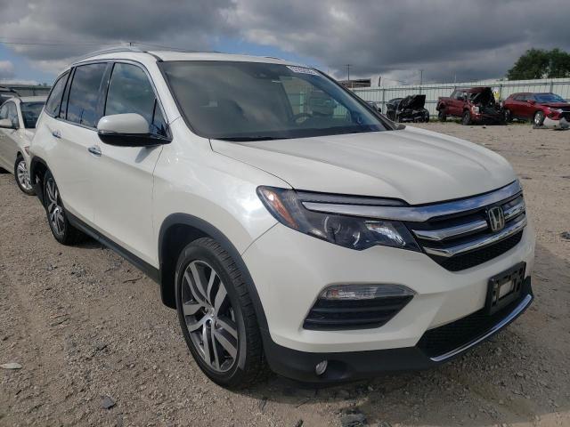 HONDA PILOT ELIT 2018 with VIN 5FNYF6H03JB009870 - Photo from auction