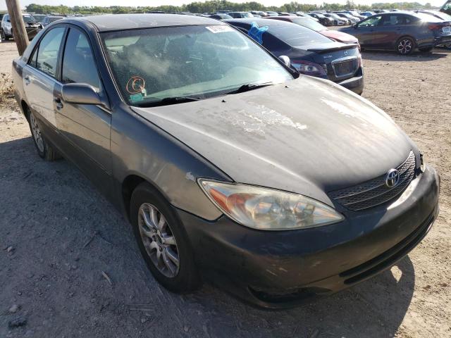 TOYOTA CAMRY LE 2002 with VIN JTDBE32K620080546 - Photo from auction