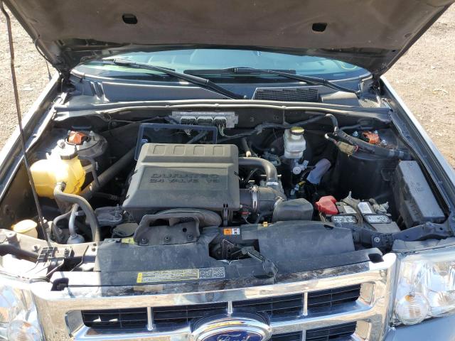 Photo 7 from auction – 2009 FORD ESCAPE LIM with VIN 1FMCU04G49KC02622