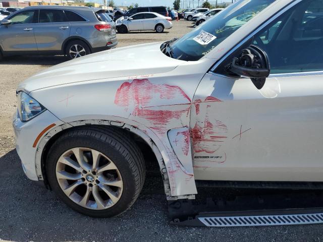 Photo 9 from auction – 2014 BMW X5 SDRIVE3 with VIN 5UXKR2C53E0C01160