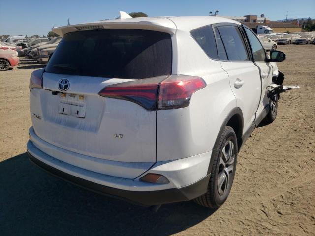 Photo 4 from auction – 2017 TOYOTA RAV4 LE with VIN JTMZFREV1HJ143219