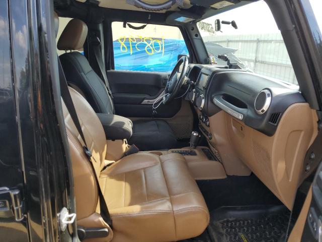Photo 5 from auction – 2011 JEEP WRANGLER U with VIN 1J4HA5H14BL627113