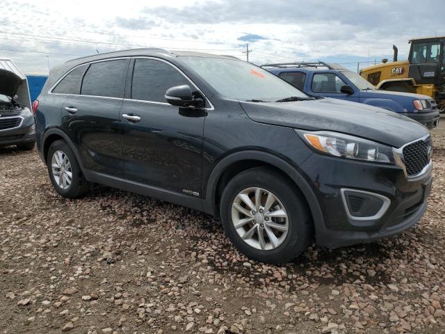 KIA SORENTO LX 2018 with VIN 5XYPGDA50JG407520 - Photo from auction