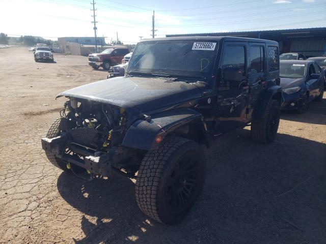Photo 2 from auction – 2013 JEEP WRANGLER U with VIN 1C4BJWEG2DL570553