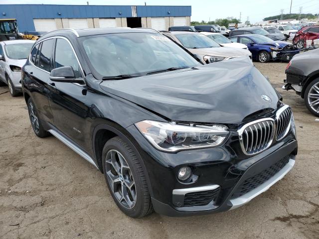 BMW X1 XDRIVE2 2018 with VIN WBXHT3C34J5F93292 - Photo from auction