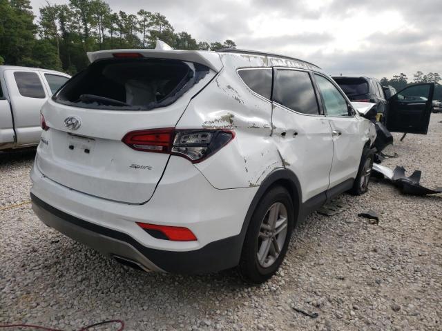 Photo 4 from auction – 2017 HYUNDAI SANTA FE S with VIN 5NMZU3LB1HH011840