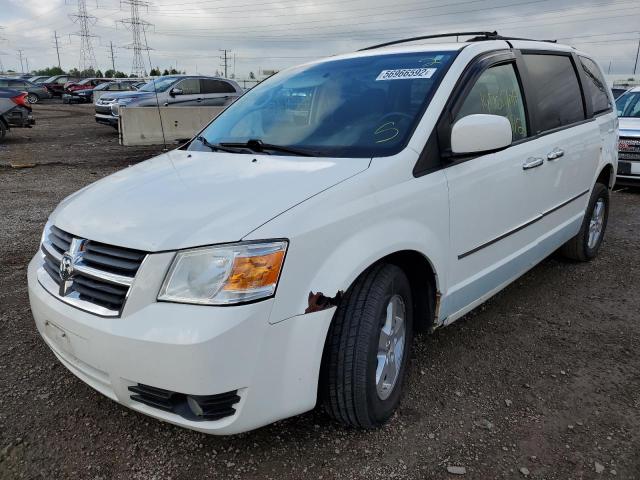 Photo 2 from auction – 2010 DODGE GRAND CARA with VIN 2D4RN5D11AR297346