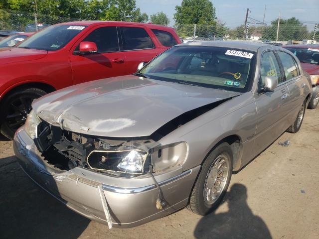 Photo 2 from auction – 2001 LINCOLN TOWNCAR with VIN 1LNHM82W91Y672581