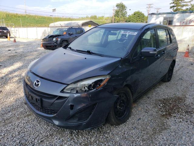 Photo 2 from auction – 2014 MAZDA 5 SPORT with VIN JM1CW2BLXE0174986