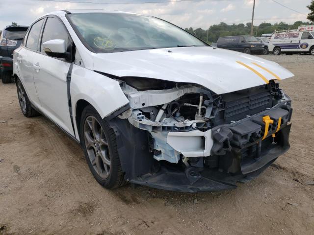 FORD FOCUS SE 2014 with VIN 1FADP3F20EL318574 - Photo from auction