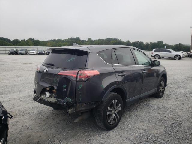 Photo 4 from auction – 2018 TOYOTA RAV4 LE with VIN 2T3ZFREV5JW429078