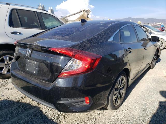 Photo 4 from auction – 2017 HONDA CIVIC EXL with VIN 2HGFC1F70HH636440