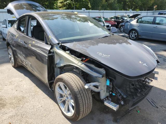 TESLA MODEL Y 2022 with VIN 7SAYGDEE9NF308273 - Photo from auction