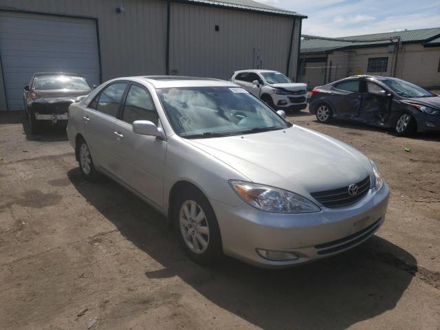 TOYOTA CAMRY LE 2003 with VIN 4T1BF30K53U047642 - Photo from auction