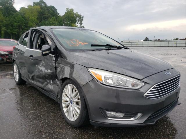 FORD FOCUS TITA 2017 with VIN 1FADP3N23HL320440 - Photo from auction