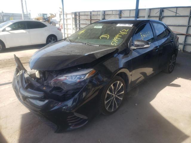 Photo 2 from auction – 2017 TOYOTA COROLLA L with VIN 5YFBURHE1HP645159