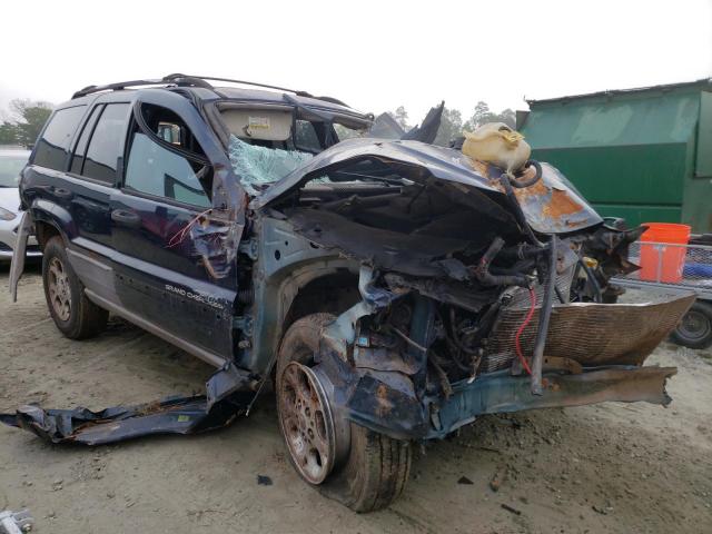 JEEP GRAND CHER 1999 with VIN 1J4G258S2XC797401 - Photo from auction