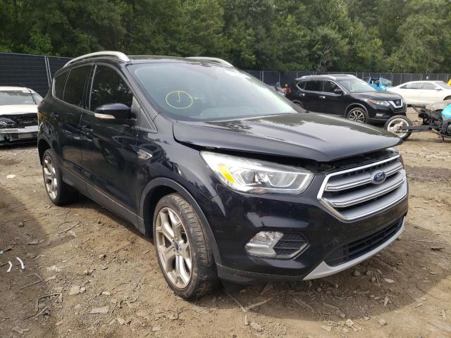 FORD ESCAPE TIT 2017 with VIN 1FMCU0JD8HUA79226 - Photo from auction