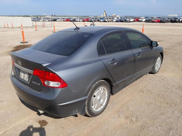 Photo 4 from auction – 2010 HONDA CIVIC HYBR with VIN JHMFA3F24AS006180