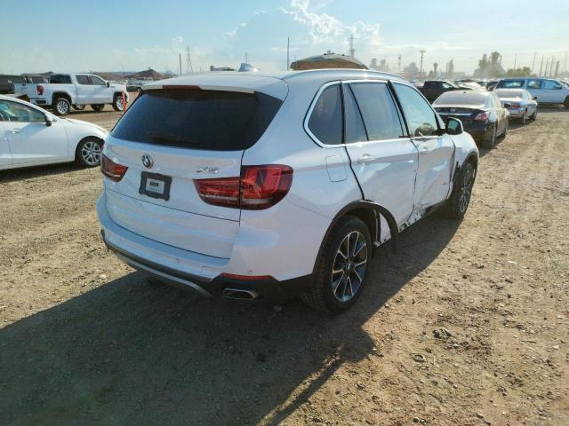 Photo 4 from auction – 2018 BMW X5 XDRIVE3 with VIN 5UXKR0C55J0X97464