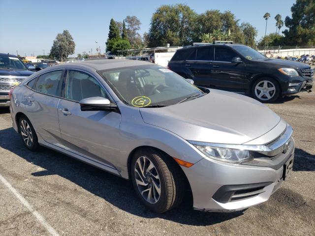 HONDA CIVIC EX 2018 with VIN 2HGFC2F77JH518199 - Photo from auction