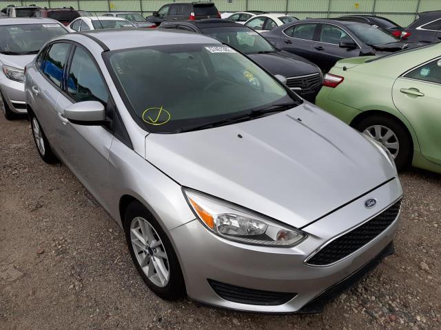 FORD FOCUS SE 2018 with VIN 1FADP3F27JL264250 - Photo from auction