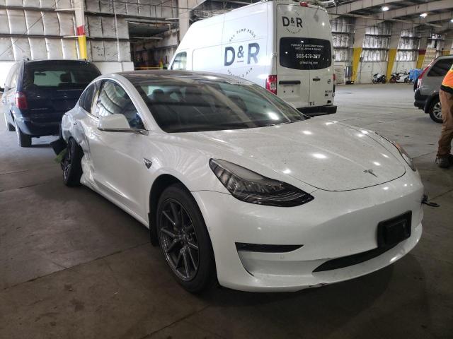 TESLA MODEL 3 2018 with VIN 5YJ3E1EB4JF112737 - Photo from auction