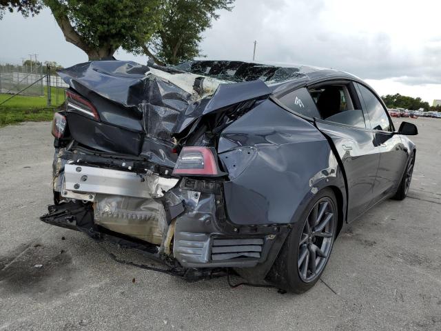 Photo 4 from auction – 2022 TESLA MODEL 3 with VIN 5YJ3E1EB5NF110663